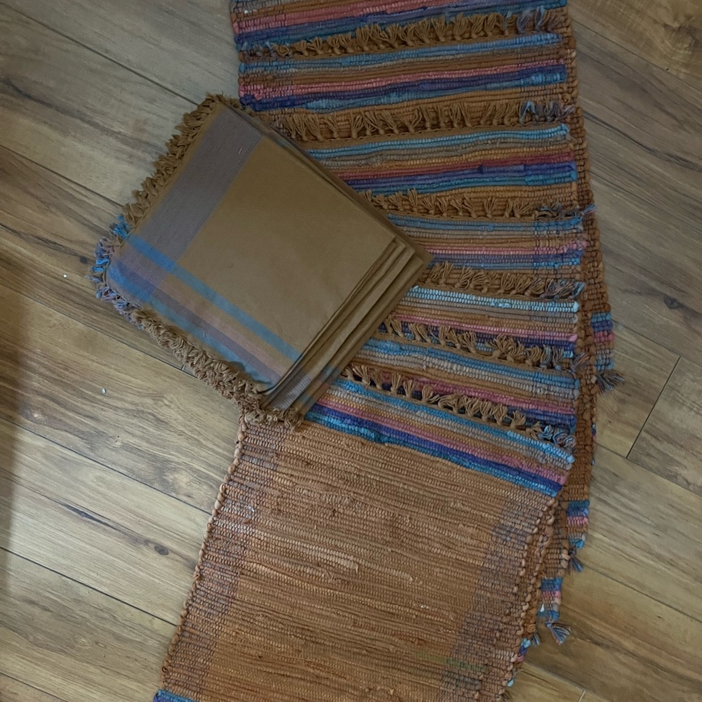 Seven woven placemats and 7 matching napkins. Never used
